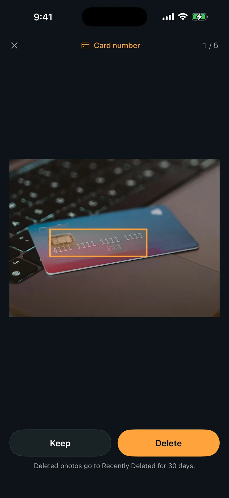 A card number found in a photo in Scour, boxed in orange on the photo itself